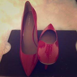 Sexy red 3 inch CK Heels.  Never been worn.